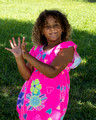 Nadia playing catch in the back yard