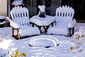 Snow covered chairs