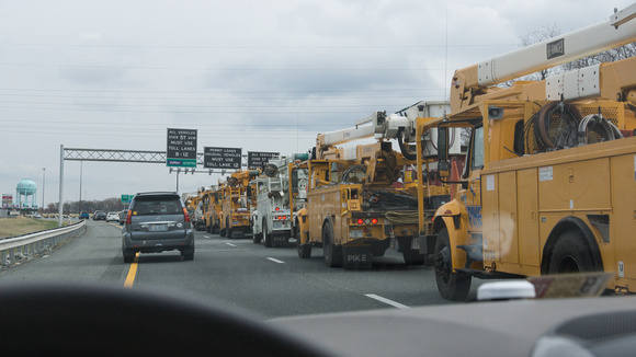 Utility vehicles heading north at Maryland toll station - to assist with hurricane Sandy damage