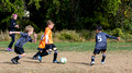 Soccer - Jackson moving the ball upfield
