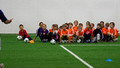 Soccer practice - paying attention to the coach