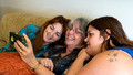 Heather, Mary Ellen and Sarah watching videos